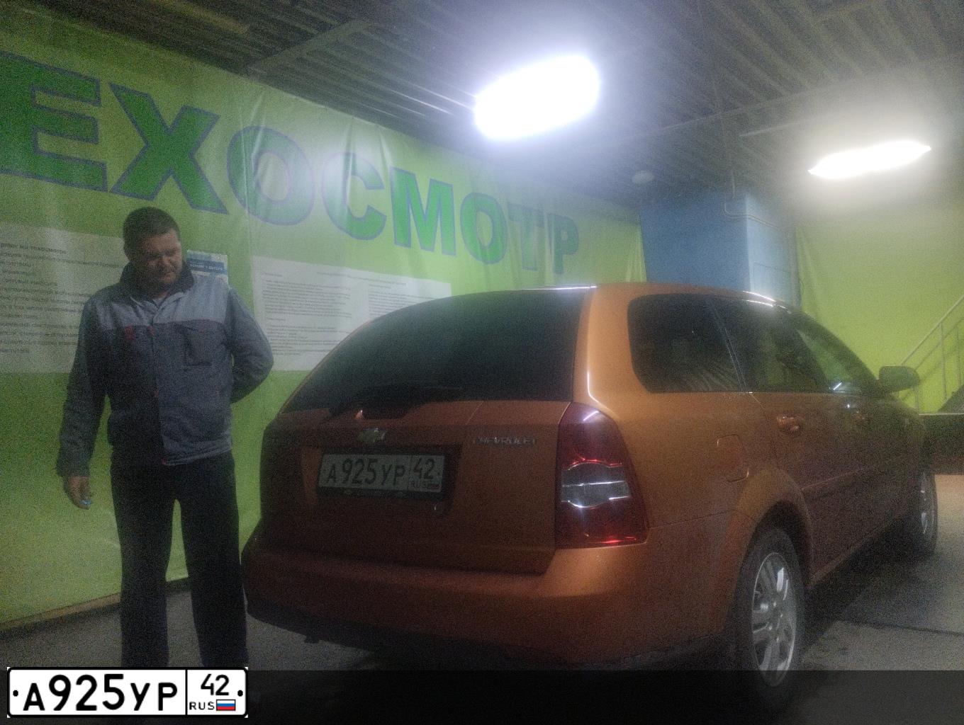 Фото автомобиля CHEVROLET LACETTI, 2006 — госномер А925УР42. Цвет: ОРАНЖЕВЫЙ
