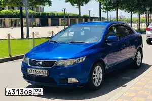 Фото автомобиля KIA CERATO, 2011 — госномер А313ОВ123. Цвет: ГОЛУБОЙ