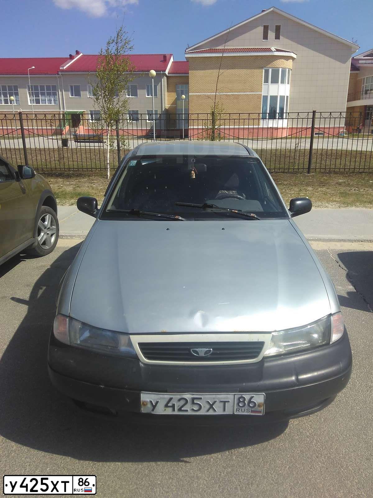 Фото автомобиля DAEWOO O NEXIA, 2007 — госномер Х321СВ86. Цвет: ПЕРЛАМУТРОВО-СЕРЕБР