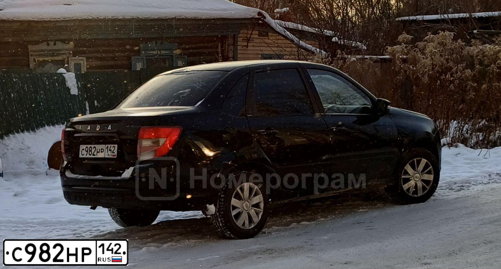 Фото автомобиля LADA GRANTA, 2023 — госномер Р283РТ154. Цвет: ЧЕРНЫЙ
