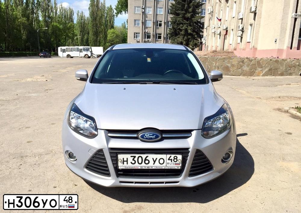 Фото автомобиля FORD FOCUS, 2012 — госномер Н968ЕМ136. Цвет: СЕРО-ГОЛУБОЙ