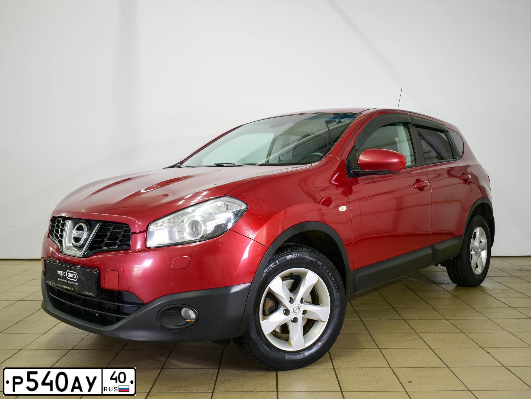 Фото автомобиля NISSAN QASHQAI, 2013 — госномер О394СУ71. Цвет: Красный
