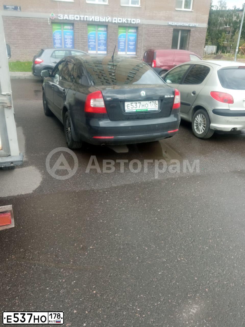 Фото автомобиля SKODA OCTAVIA, 2011 — госномер Е537НО178
