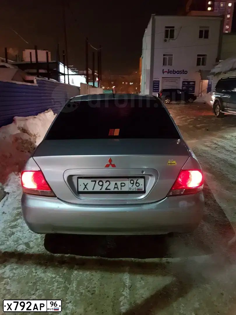 Фото автомобиля MITSUBISHI LANCER, 2005 — госномер Х792АР96. Цвет: СЕРЕБРИСТЫЙ