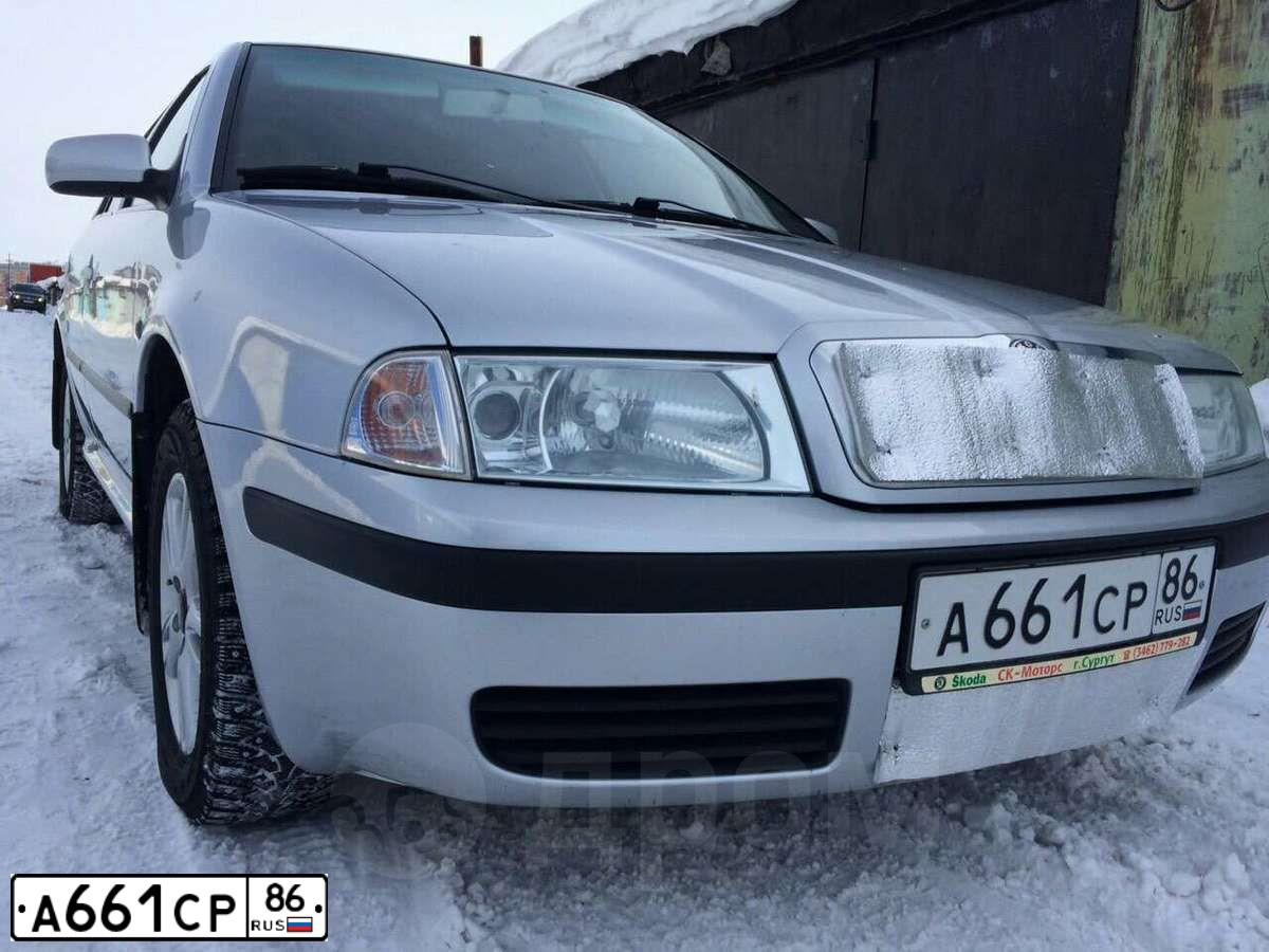 Фото автомобиля SKODA OCTAVIA, 2008 — госномер А555ТХ86. Цвет: Серебристый