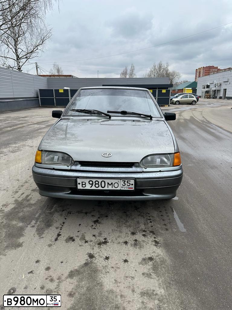 Фото автомобиля LADA 2114 SAMARA, 2011 — госномер В980МО35. Цвет: средний серо-зеленый металлик