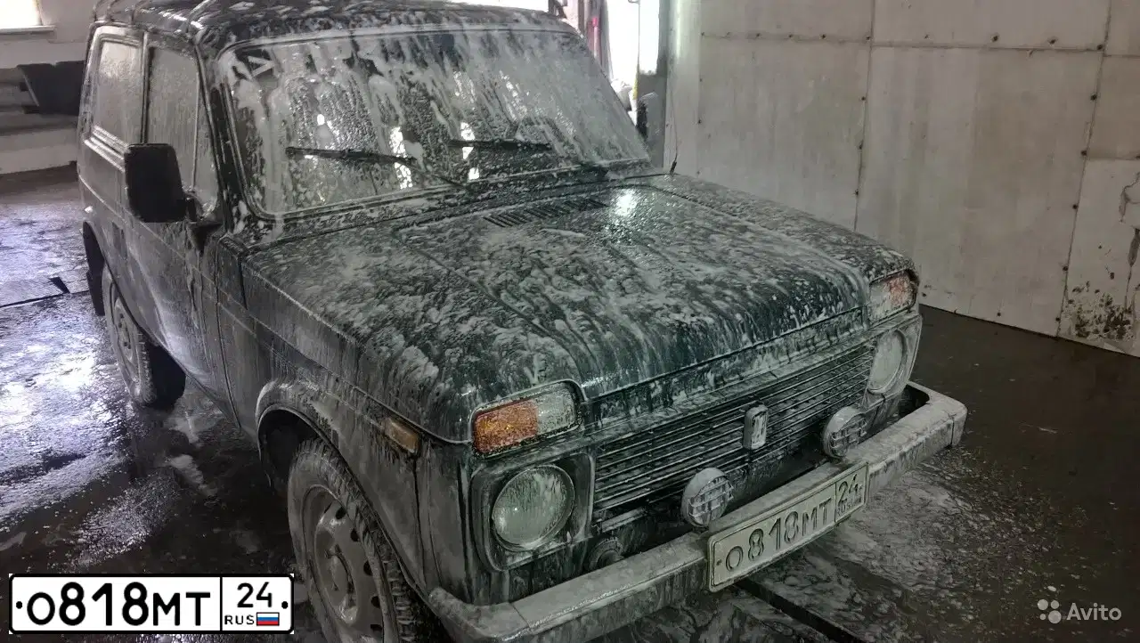 Фото автомобиля LADA 2121 NIVA, 1996 — госномер О818МТ24. Цвет: ЗЕЛЕНЫЙ