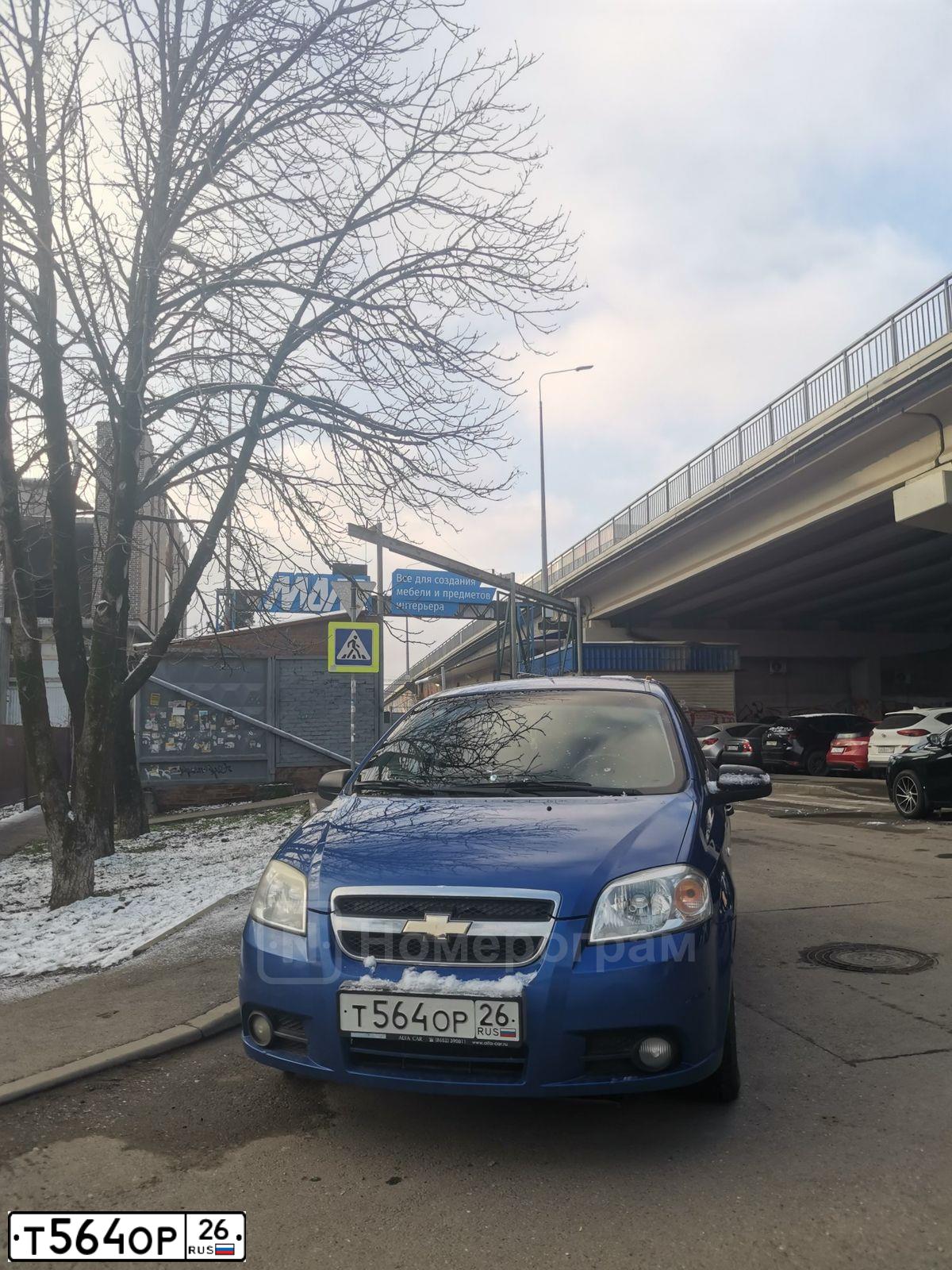 Фото автомобиля CHEVROLET AVEO, 2007 — госномер Т564ОР26. Цвет: СИНИЙ