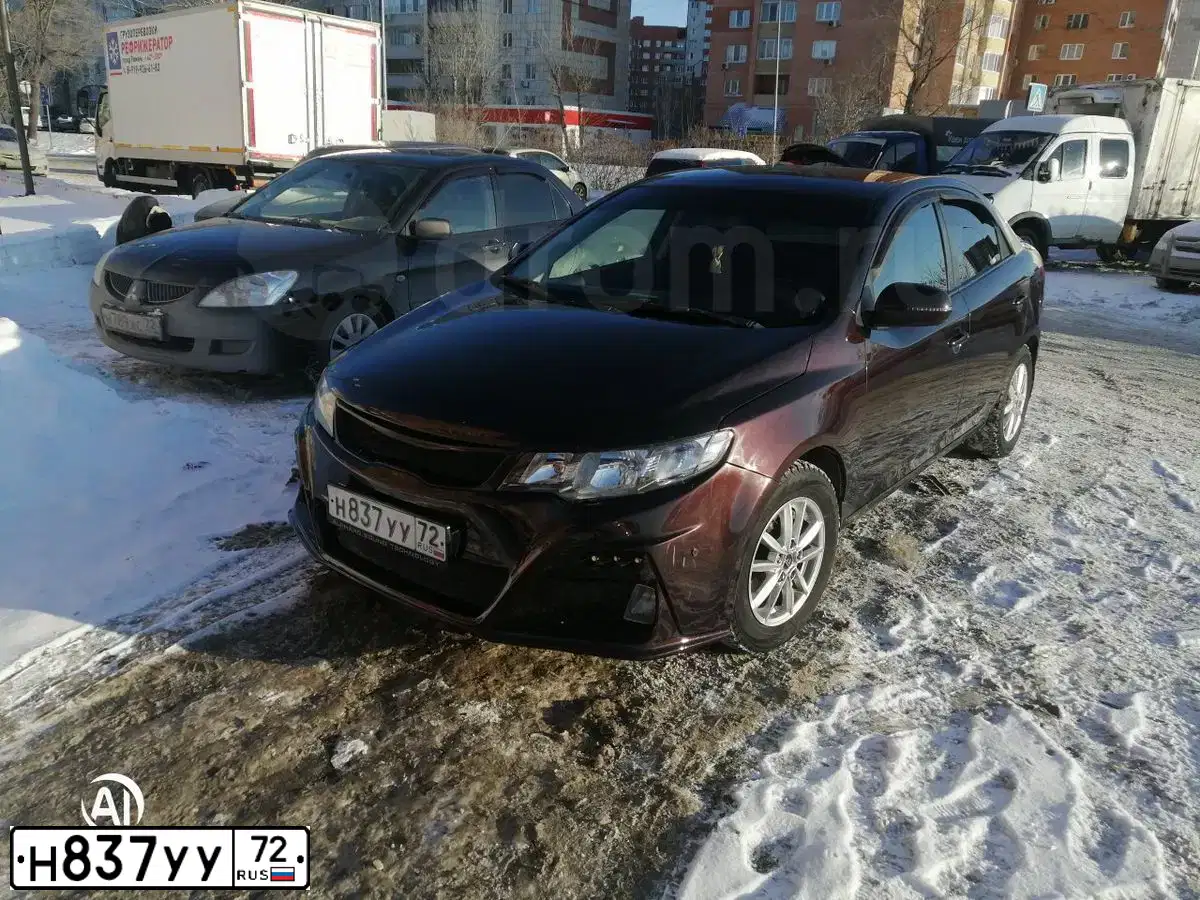 Фото автомобиля KIA CERATO, 2011 — госномер А381ММ702. Цвет: ТЕМНО-ВИШНЕВЫЙ