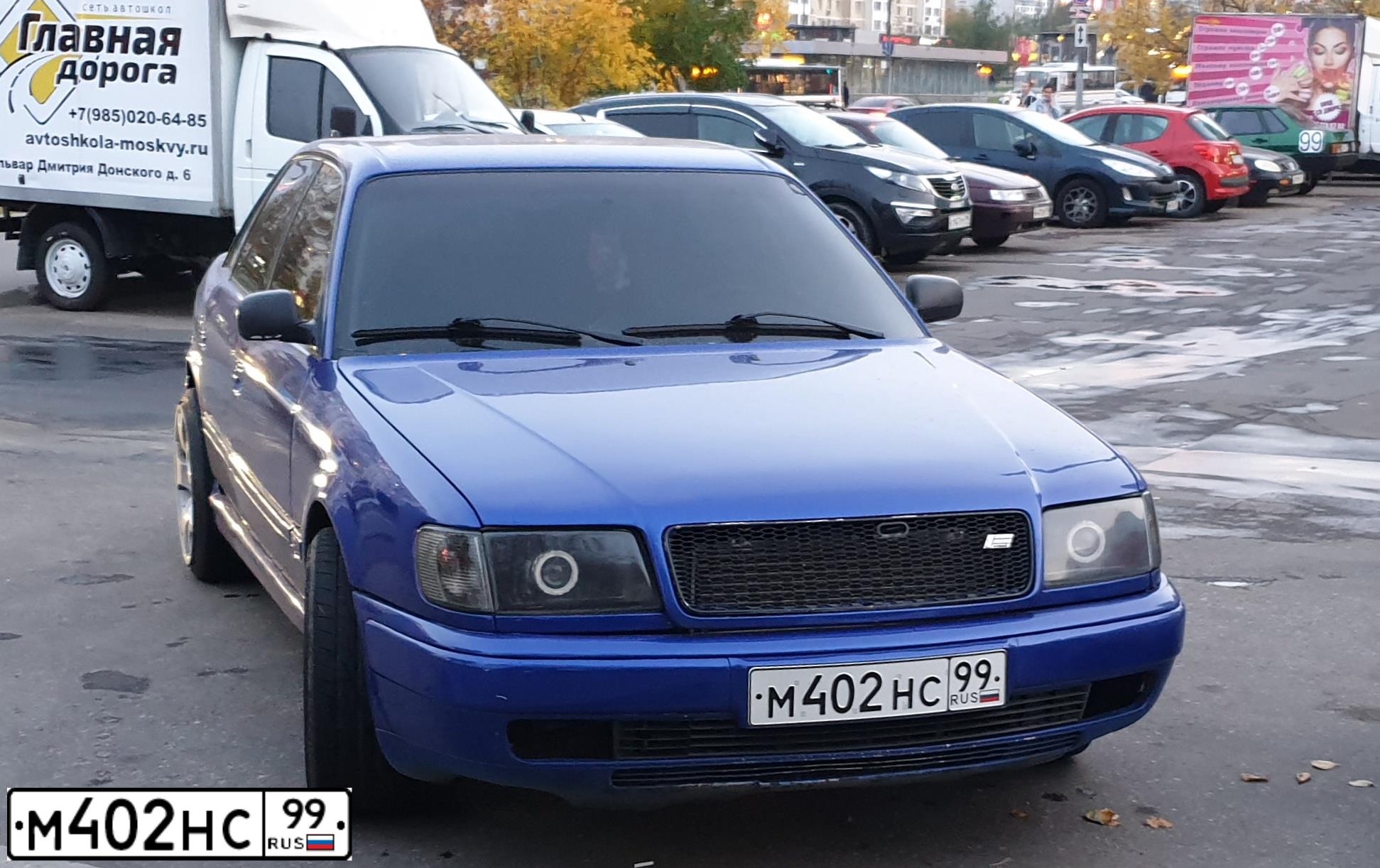Фото автомобиля AUDI 100, 1993 — госномер М402НС99. Цвет: ТЕМНО-СИНИЙ