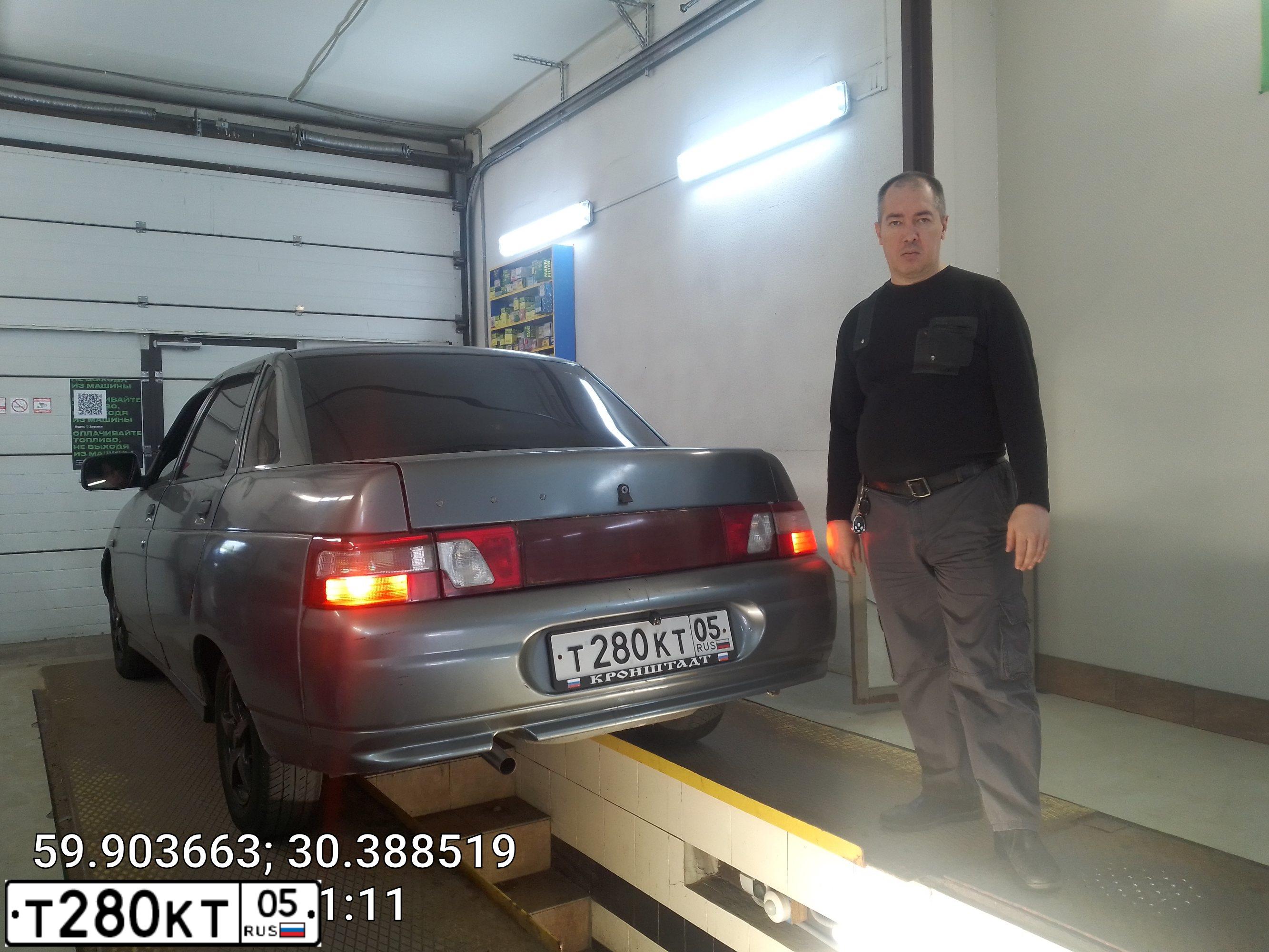 Фото автомобиля LADA 2110, 2006 — госномер Е038КА11. Цвет: СРЕДНИЙ СЕРО-ЗЕЛЕНЫЙ МЕТ