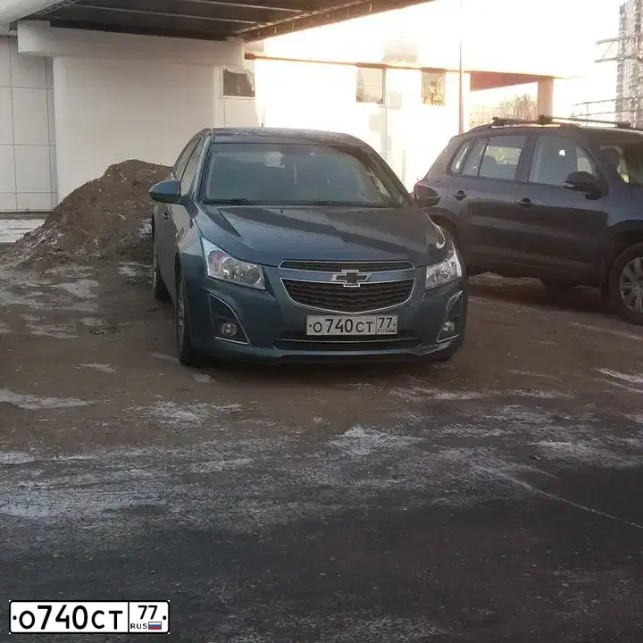 Фото автомобиля CHEVROLET CRUZE, 2013 — госномер А574КС138. Цвет: синий