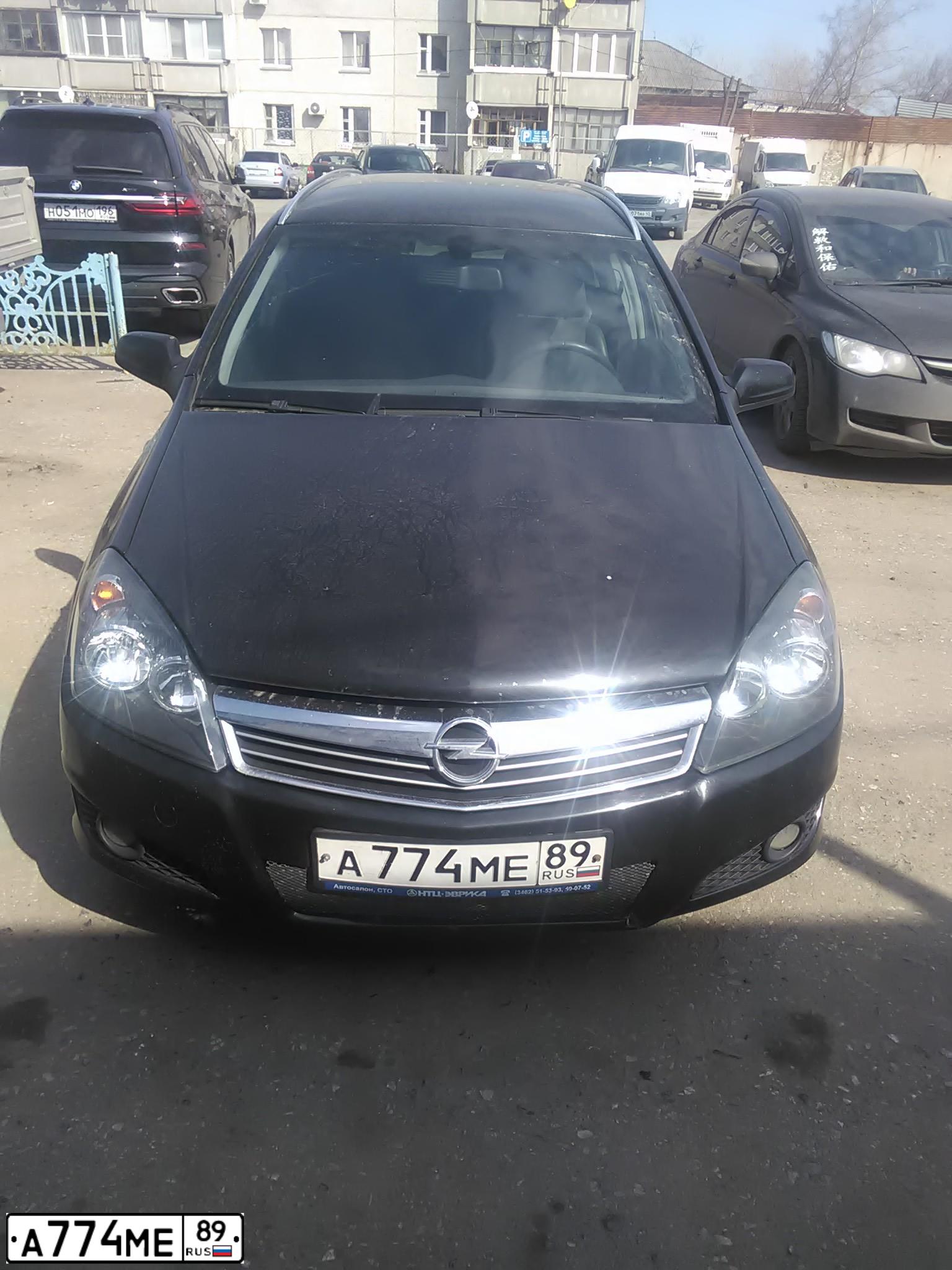 Фото автомобиля OPEL ASTRA, 2008 — госномер О228УН29. Цвет: ЧЕРНЫЙ