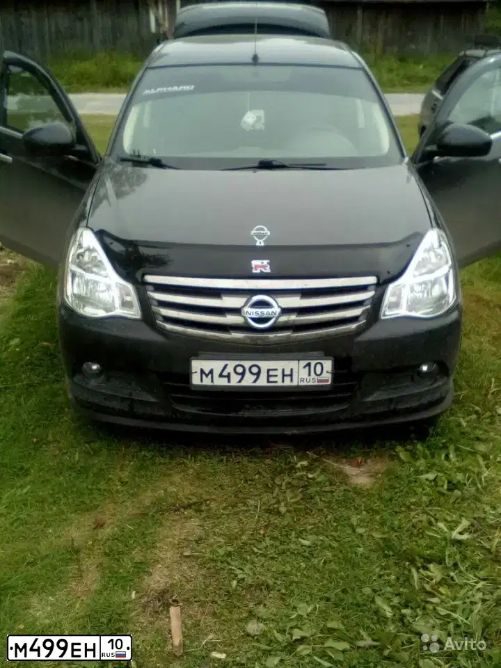 Фото автомобиля NISSAN ALMERA /AVTOVAZ/, 2013 — госномер О488АВ29. Цвет: ЧЕРНЫЙ