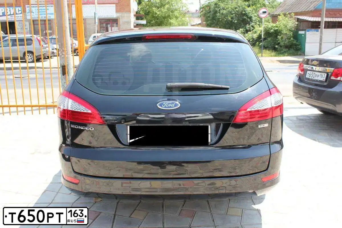 Фото автомобиля LADA 2190 GRANTA, 2013 — госномер О916УМ05. Цвет: Белый