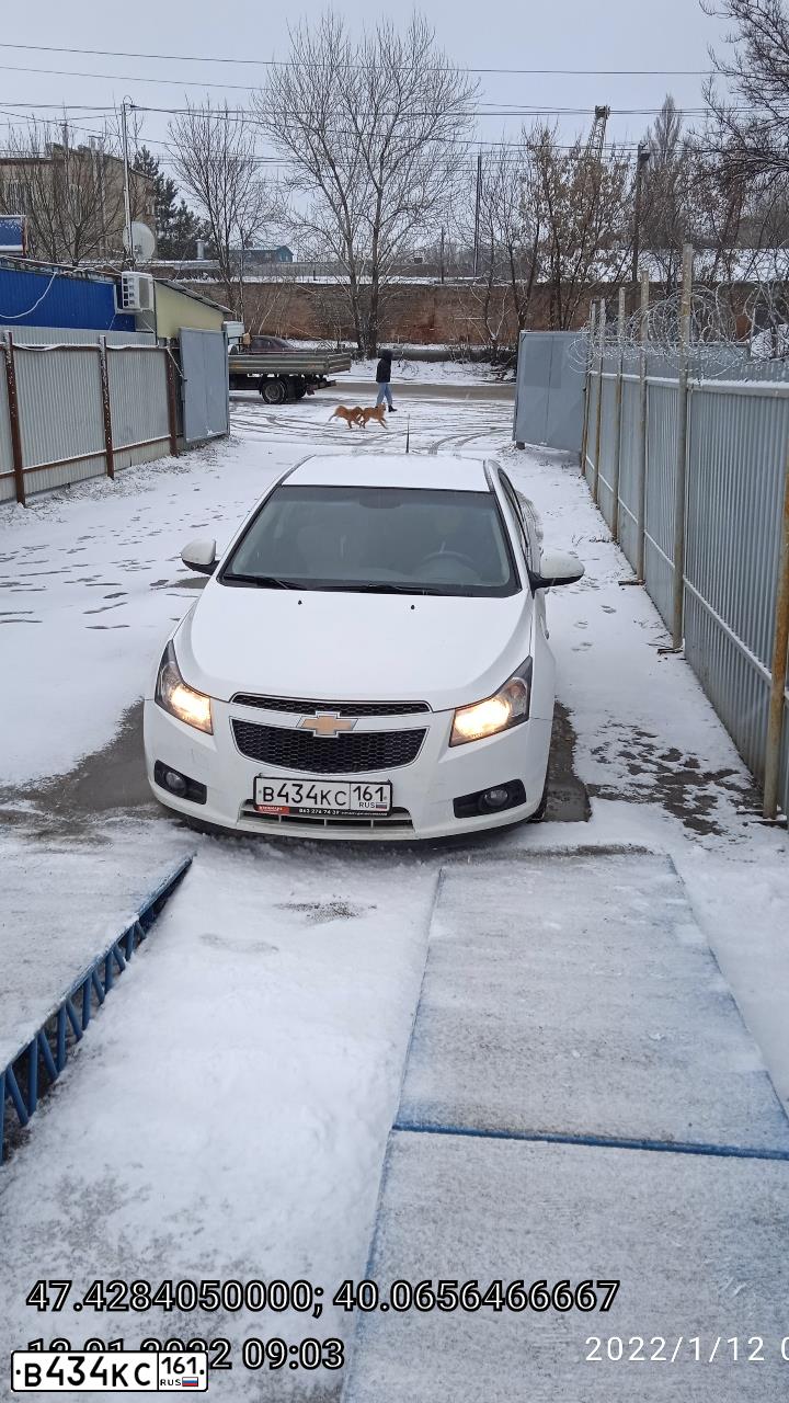 Фото автомобиля CHEVROLET CRUZE, 2010 — госномер В434КС161. Цвет: Белый