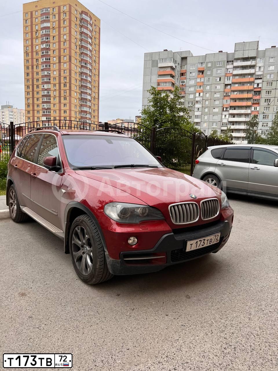 Фото автомобиля BMW X5, 2009 — госномер Т173ТВ72. Цвет: ТЕМНО-КРАСНЫЙ