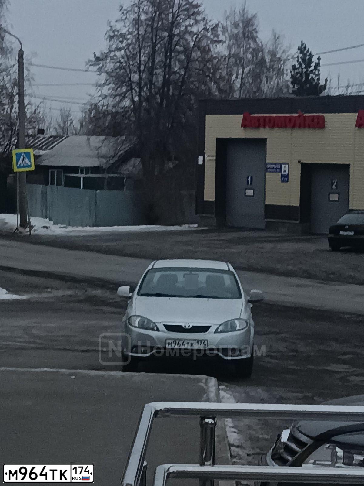 Фото автомобиля DAEWOO GENTRA, 2014 — госномер М964ТК174. Цвет: СЕРЕБРИСТЫЙ