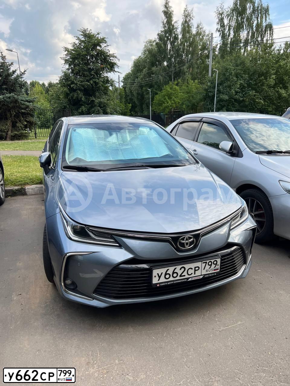 Фото автомобиля TOYOTA COROLLA, 2019 — госномер У662СР799. Цвет: Серый
