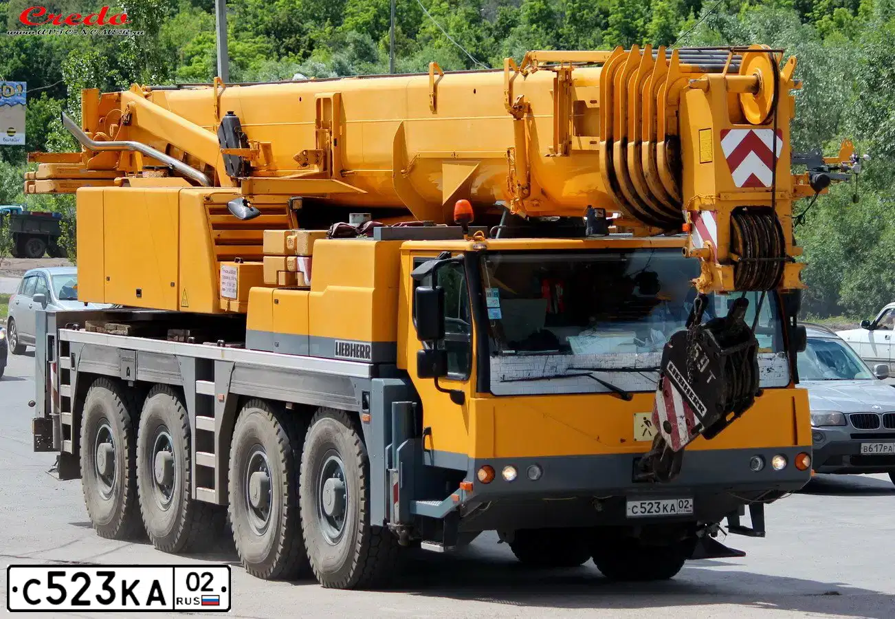 Фото автомобиля LIEBHERR LTM-SERIE, 2005 — госномер С523КА02. Цвет: ЖЁЛТЫЙ