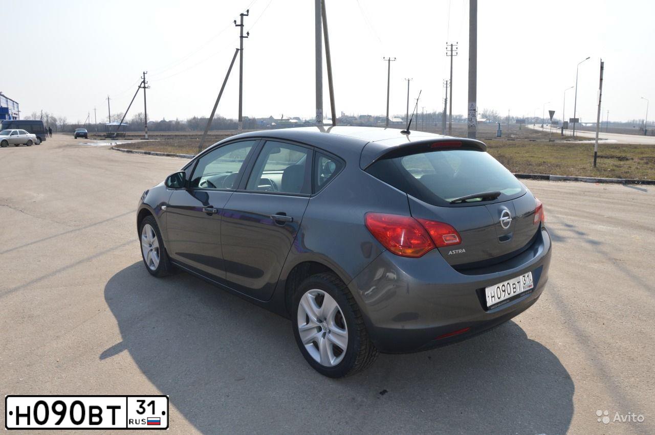 Фото автомобиля OPEL ASTRA, 2012 — госномер Н729ТМ32. Цвет: СЕРЫЙ МЕТАЛЛИК