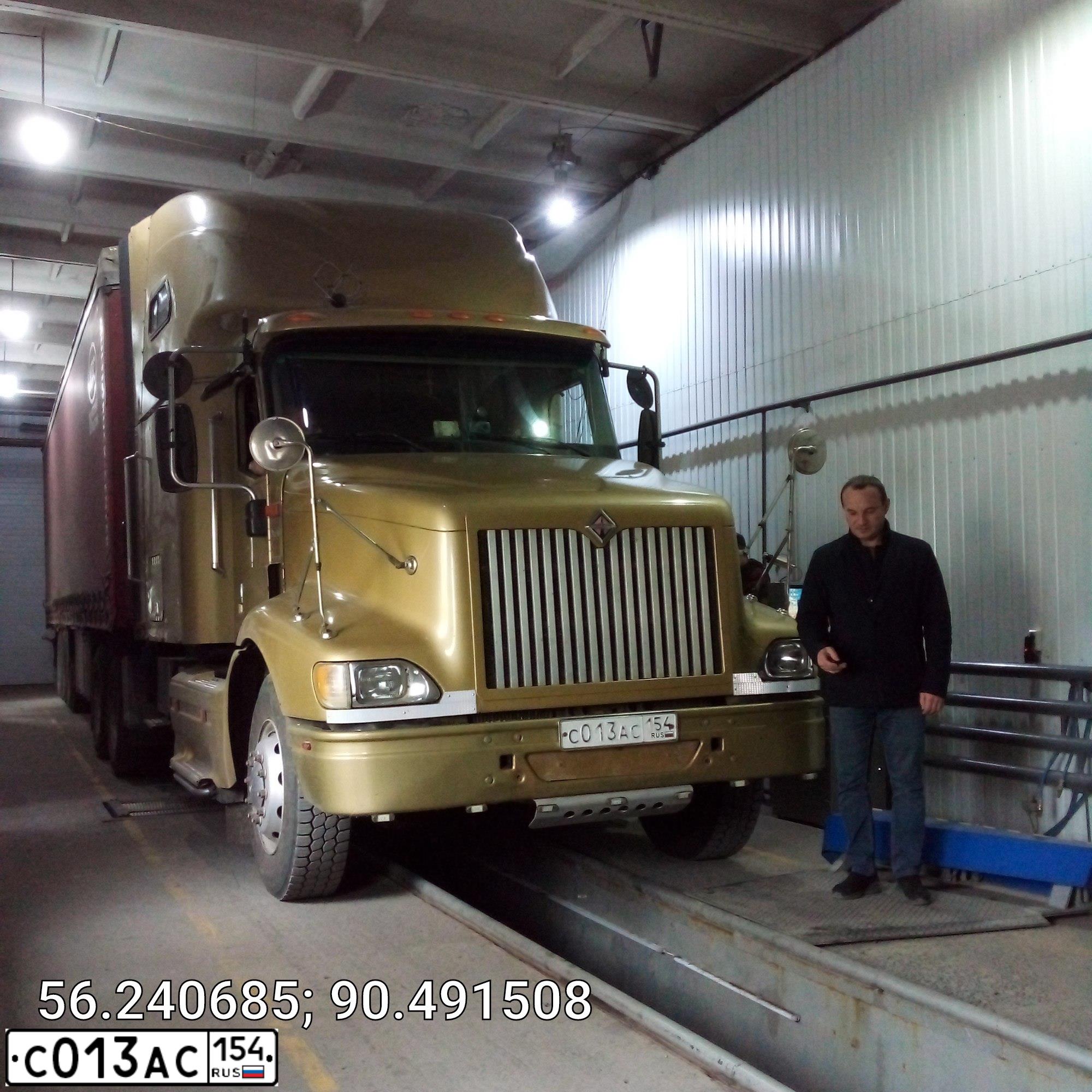 Фото автомобиля INTERNATIONAL HEAVY TRUCK 8500-9900, 2003 — госномер С013АС154. Цвет: ЖЁЛТЫЙ