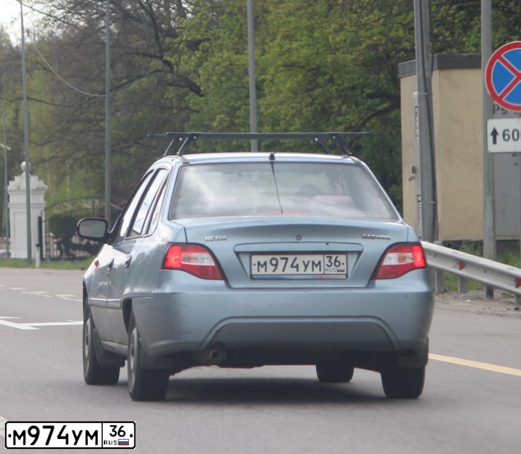 Фото автомобиля DAEWOO NEXIA, 2012 — госномер Т938ЕА64. Цвет: БЛЕДНО-ЧЕРНЫЙ