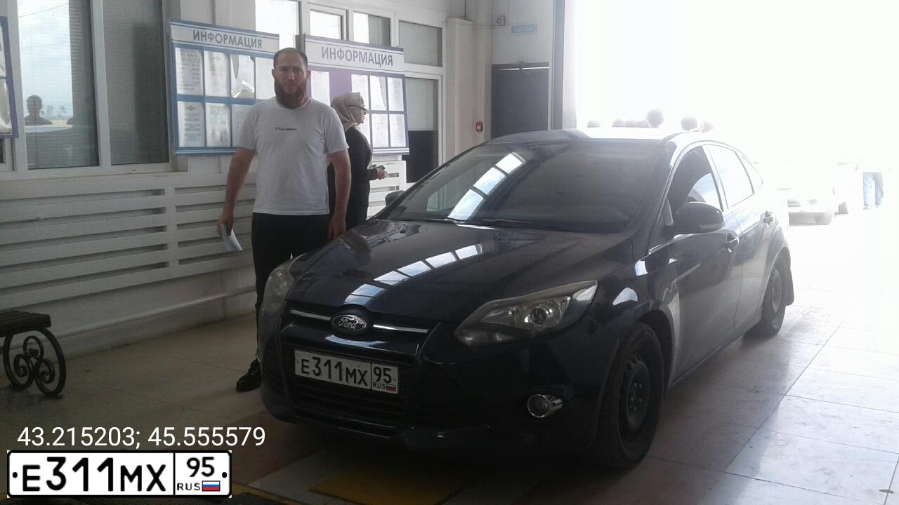 Фото автомобиля FORD FOCUS, 2012 — госномер О722ВО05. Цвет: СЕРЫЙ ТЕМНЫЙ