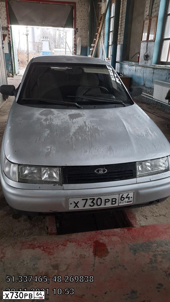 Фото автомобиля LADA 2112, 2001 — госномер Х730РВ64. Цвет: Серебристый
