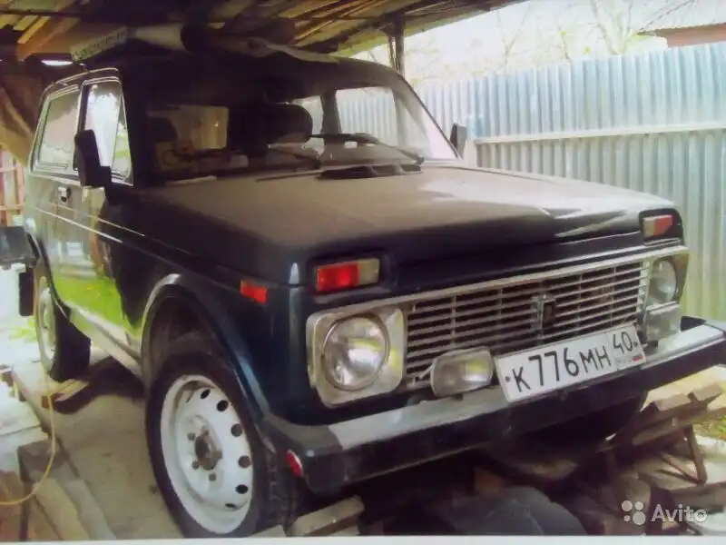 Фото автомобиля LADA 2121 NIVA, 1996 — госномер Т513АМ196. Цвет: ТЕМНО-СЕРЫЙ