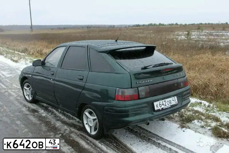 Фото автомобиля LADA 2112 LADA, 2001 — госномер А777ЕО43. Цвет: Темно-зеленый