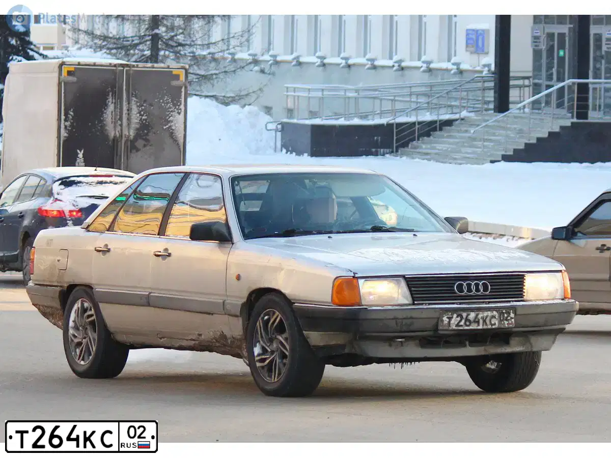 Фото автомобиля AUDI 100, 1987 — госномер Н201НА02. Цвет: СЕРЫЙ