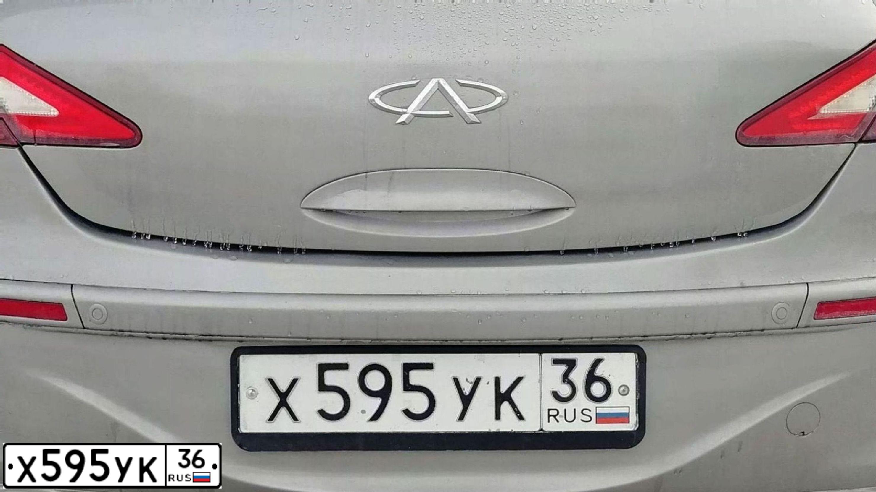 Фото автомобиля CHERY A3 /M11/, 2011 — госномер О927МА136. Цвет: СЕРЫЙ