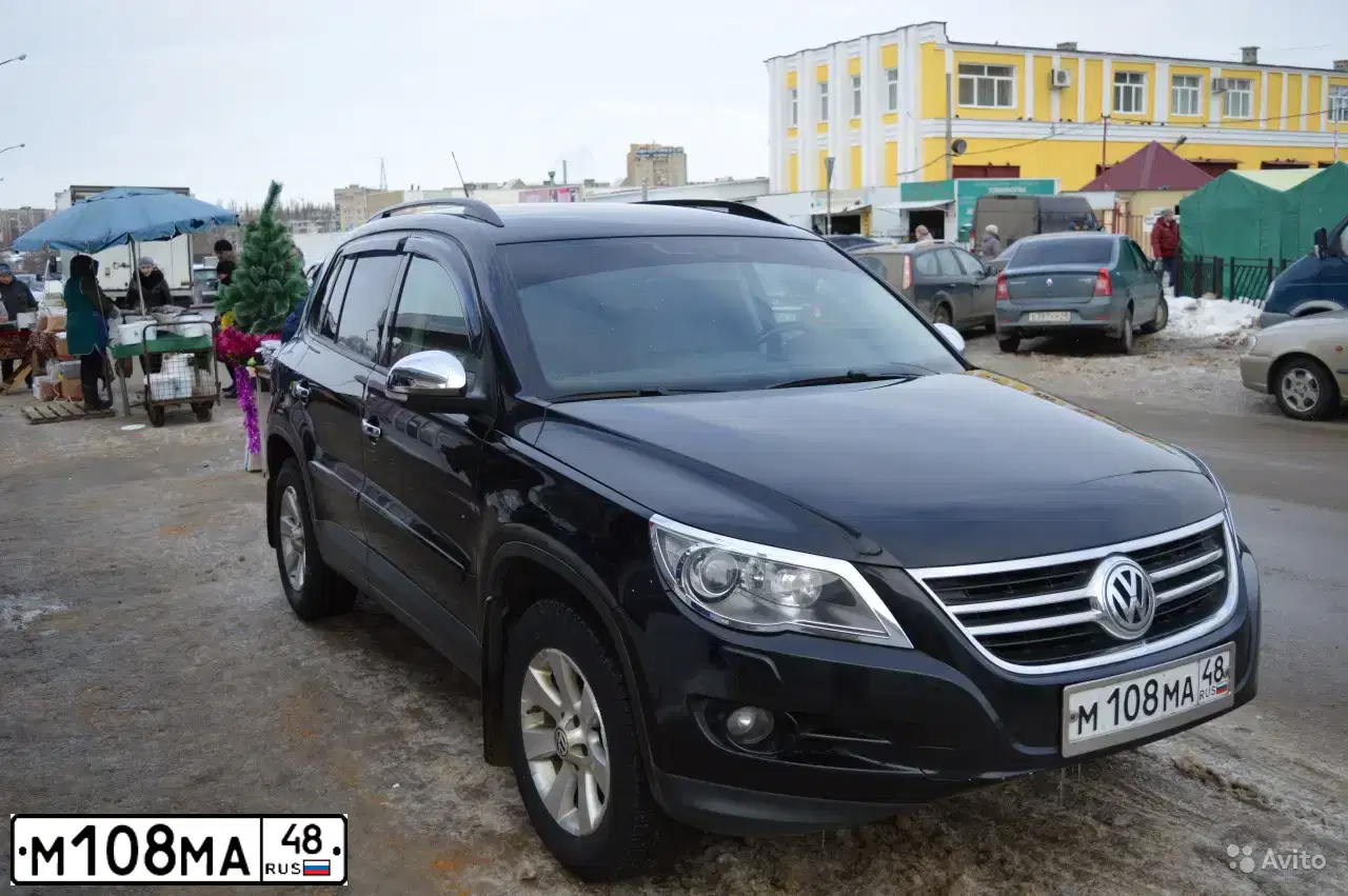 Фото автомобиля VOLKSWAGEN TIGUAN, 2009 — госномер М474АМ57. Цвет: ЧЕРНЫЙ