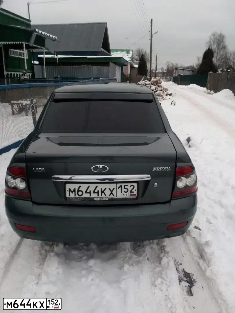 Фото автомобиля LADA 2170 PRIORA, 2011 — госномер Е515КХ152. Цвет: СЕРО-ЗЕЛЕНЫЙ