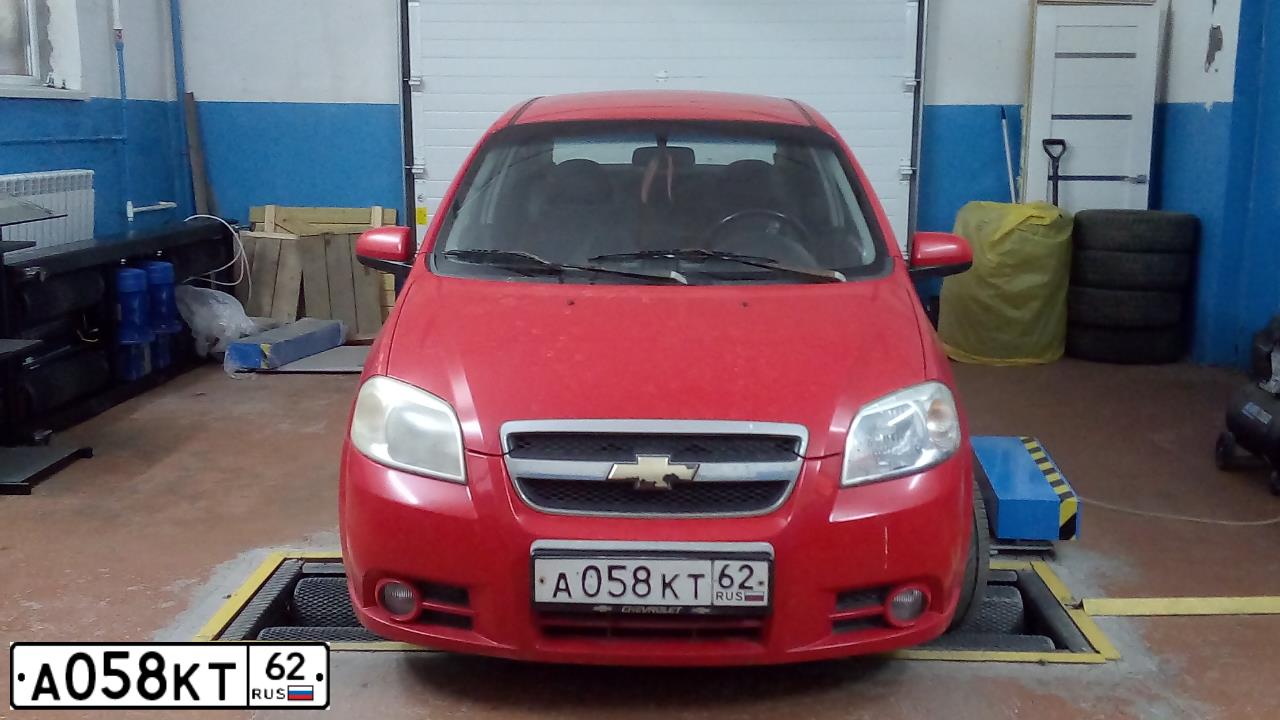 Фото автомобиля CHEVROLET AVEO, 2007 — госномер А058КТ62. Цвет: КРАСНЫЙ