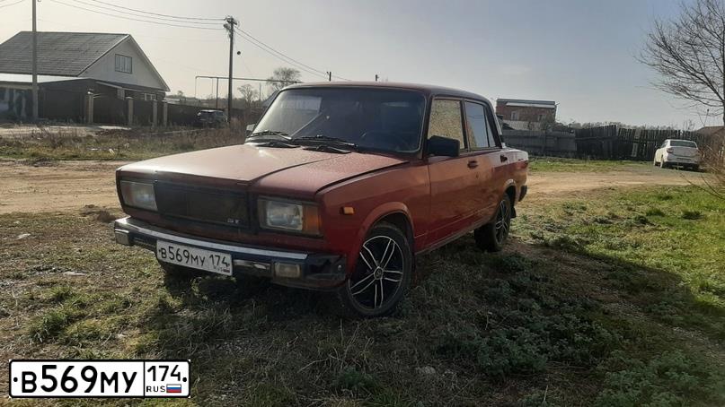 Фото автомобиля LADA 2107, 2007 — госномер В569МУ174. Цвет: ВИШНЕВЫЙ