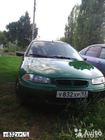 Фото автомобиля ROVER 214, 1999 — госномер В910КН01. Цвет: ЗЕЛЕНЫЙ