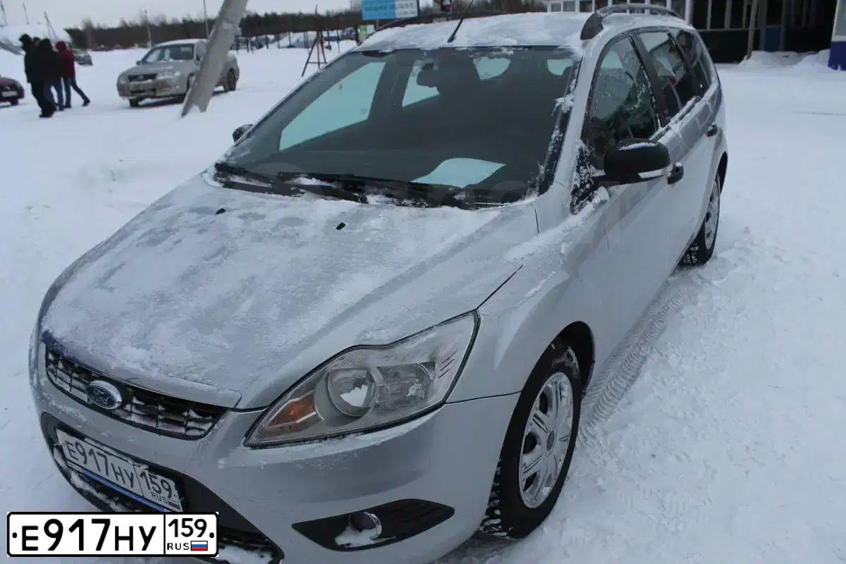 Фото автомобиля FORD FOCUS, 2009 — госномер Е917НУ159. Цвет: СЕРЕБРИСТЫЙ