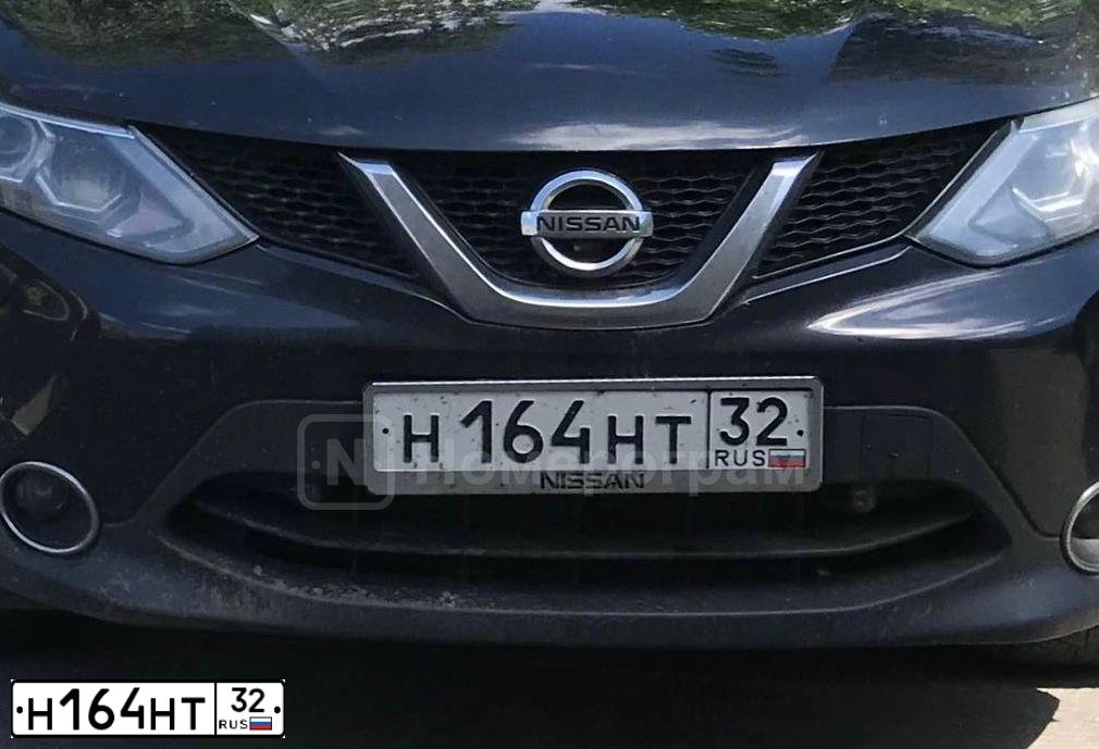 Фото автомобиля NISSAN QASHQAI, 2017 — госномер Н164НТ32. Цвет: ЧЕРНЫЙ