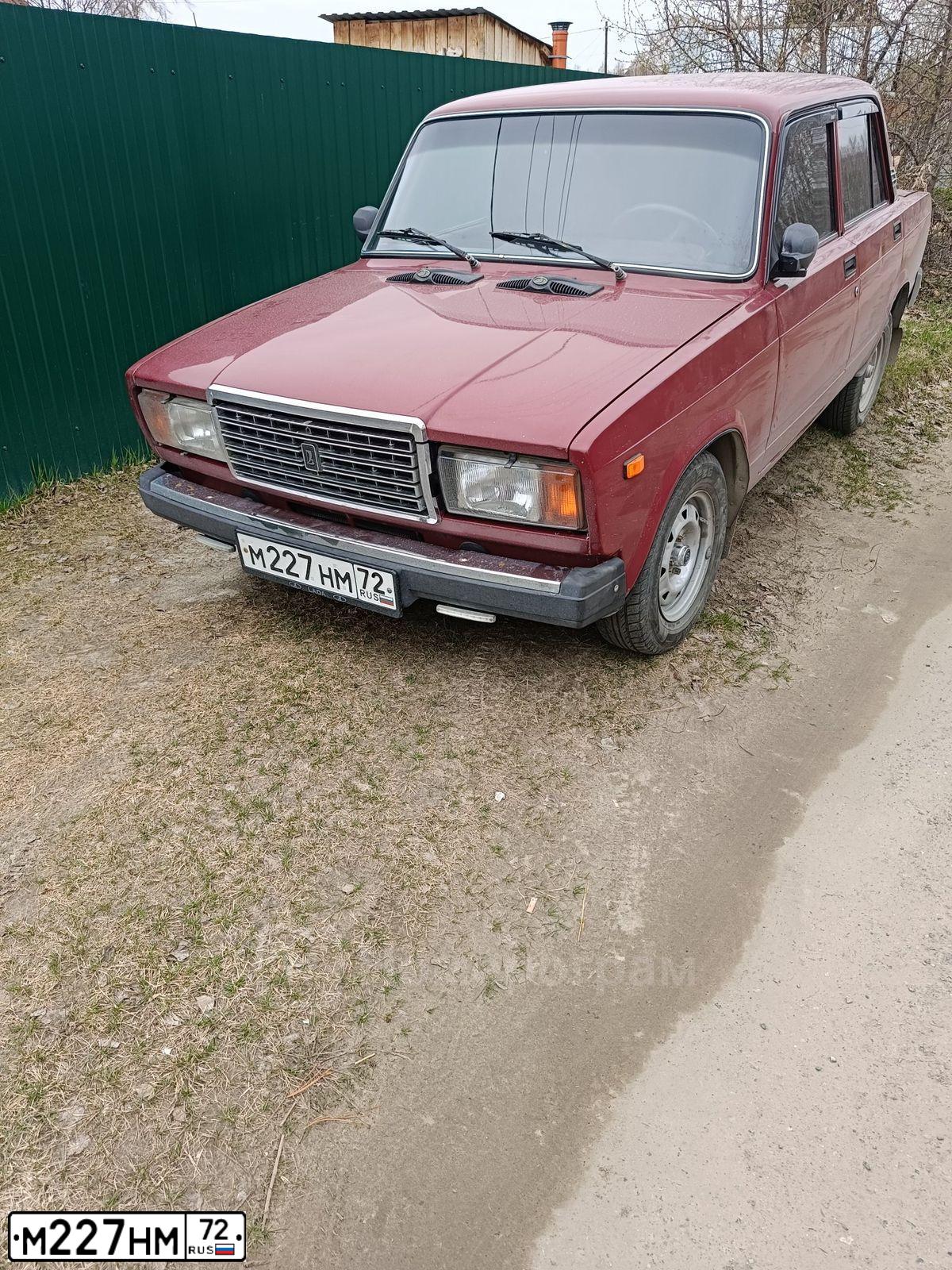 Фото автомобиля LADA 2107 LADA, 2009 — госномер М227НМ72. Цвет: ВИШНЕВЫЙ
