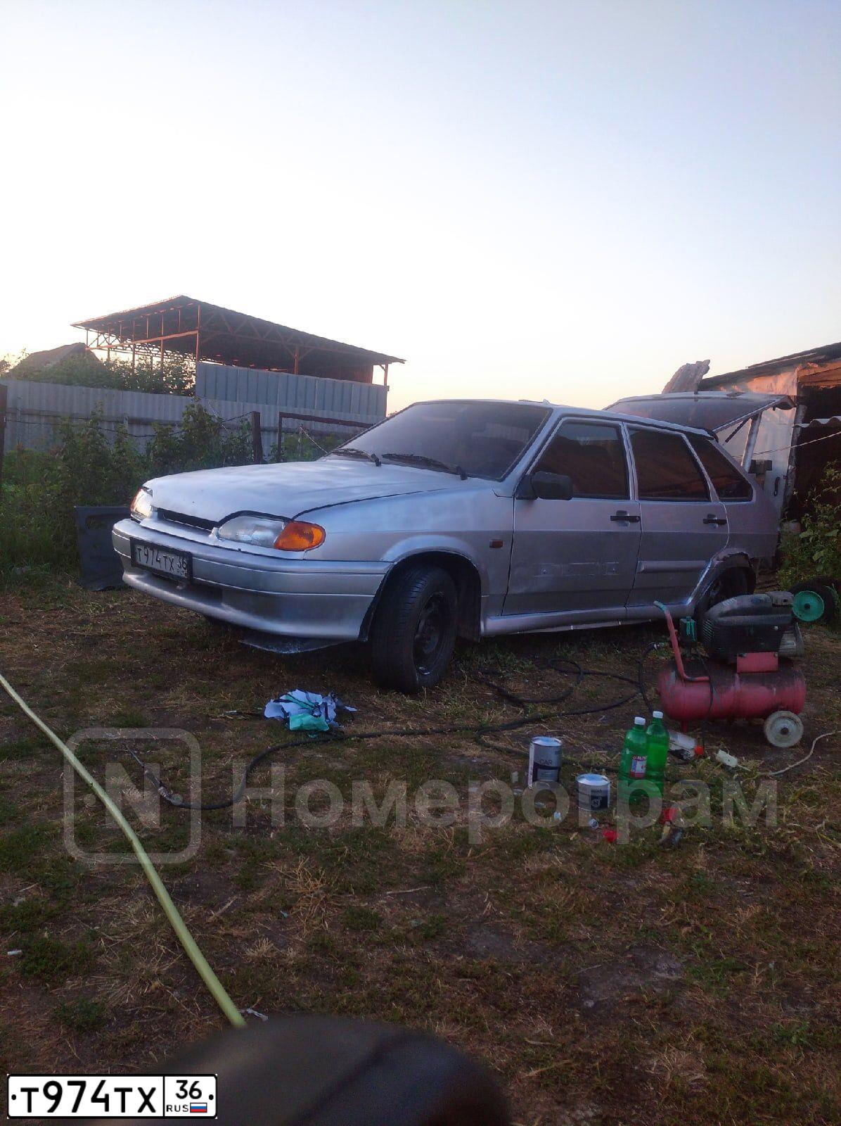 Фото автомобиля LADA 2114 SAMARA, 2011 — госномер Т974ТХ36. Цвет: СВЕТЛО-СЕРЕБРИСТЫЙ МЕТАЛЛИК