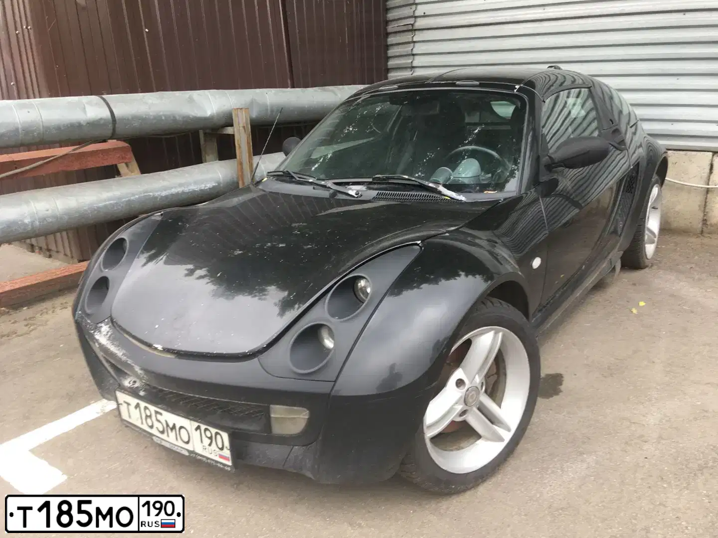 Фото автомобиля SMART ROADSTER, 2003 — госномер Е118РТ797. Цвет: ЧЕРНЫЙ