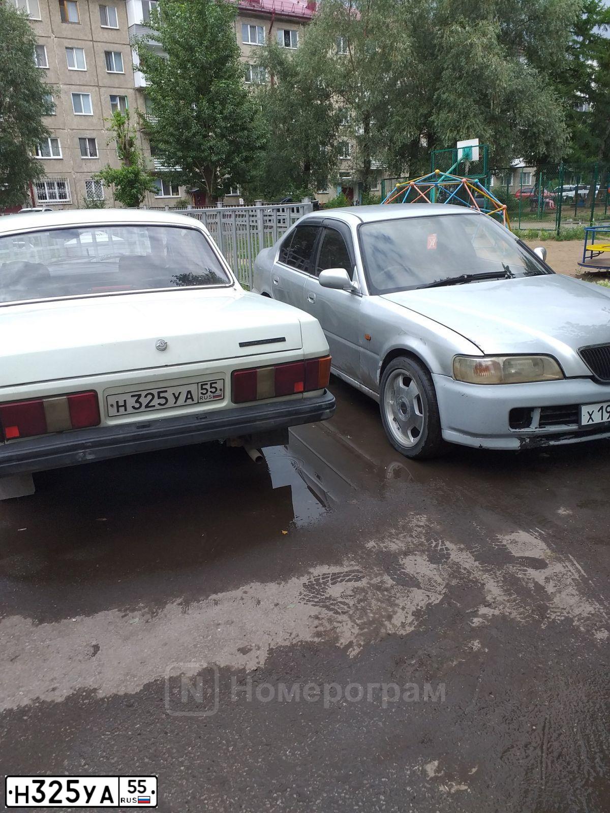 Фото автомобиля GAZ Z 3102 WOLGA, 1996 — госномер Н325УА55. Цвет: Белый