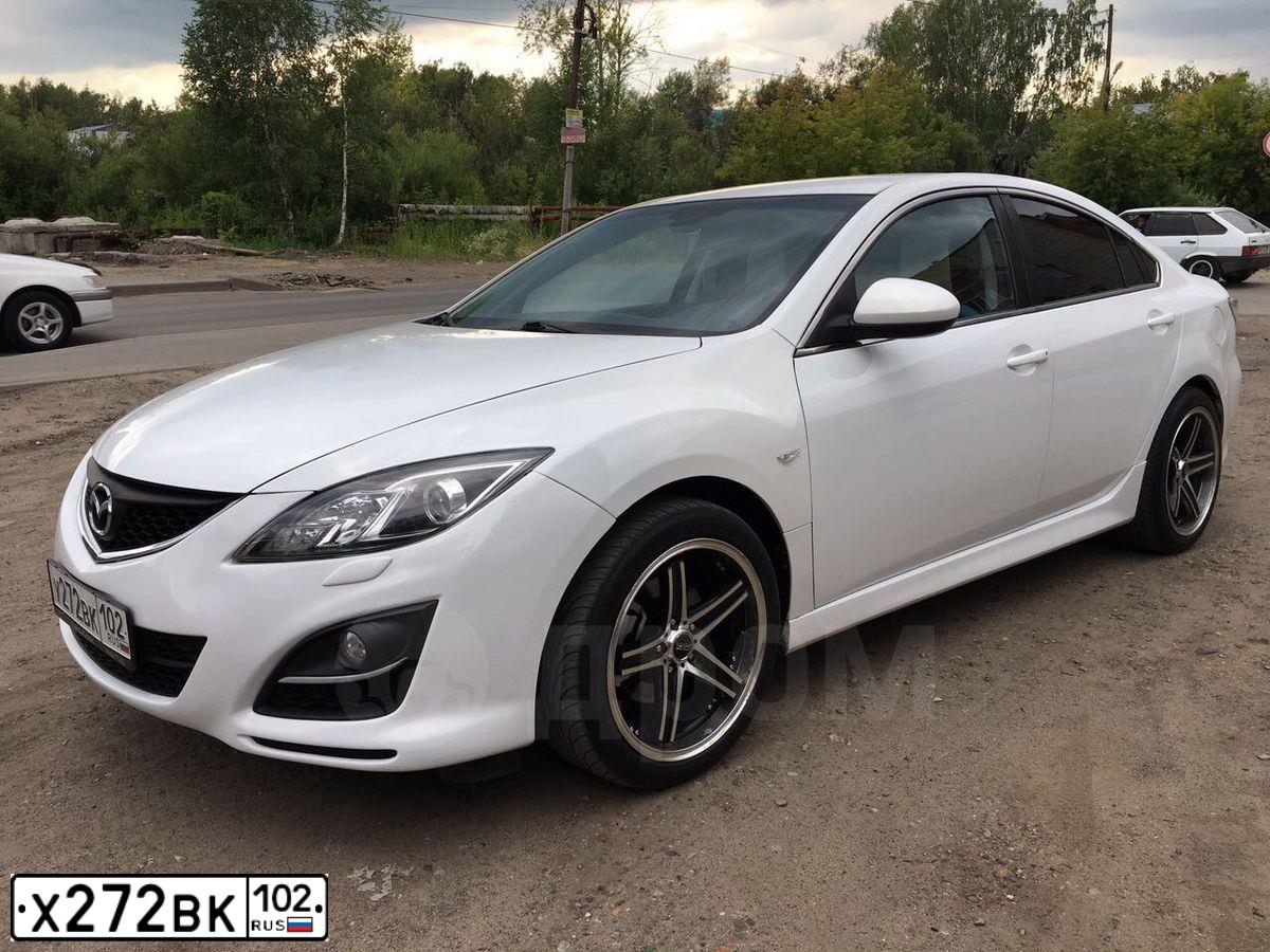 Фото автомобиля KIA SELTOS, 2021 — госномер М516ОТ702. Цвет: ЧЕРНЫЙ