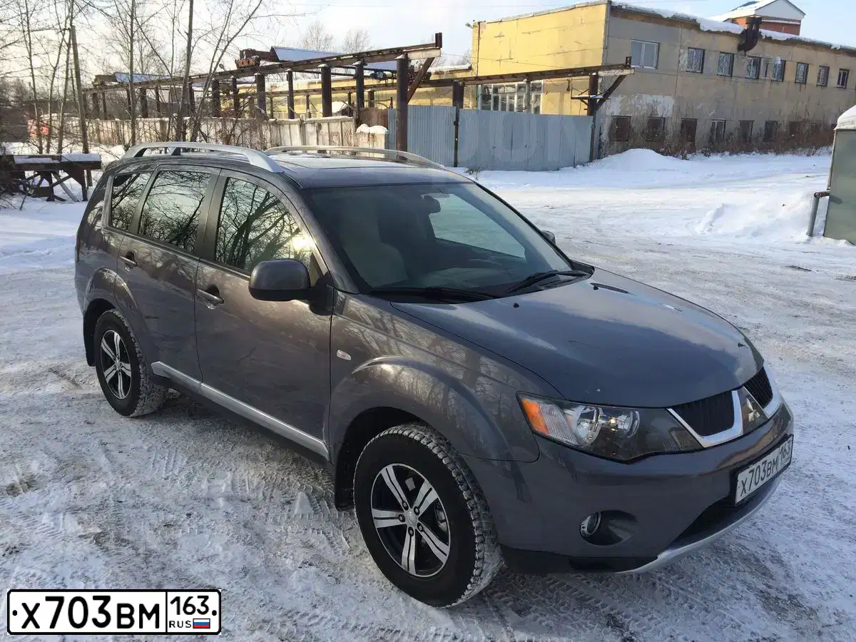 Фото автомобиля MITSUBISHI OUTLANDER, 2008 — госномер М112КТ163. Цвет: СЕРЫЙ