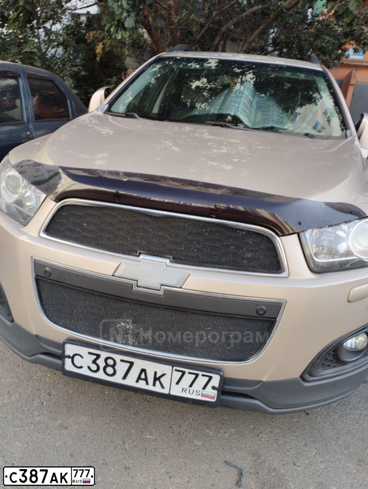 Фото автомобиля CHEVROLET CAPTIVA, 2013 — госномер С387АК777. Цвет: БЕЖЕВЫЙ