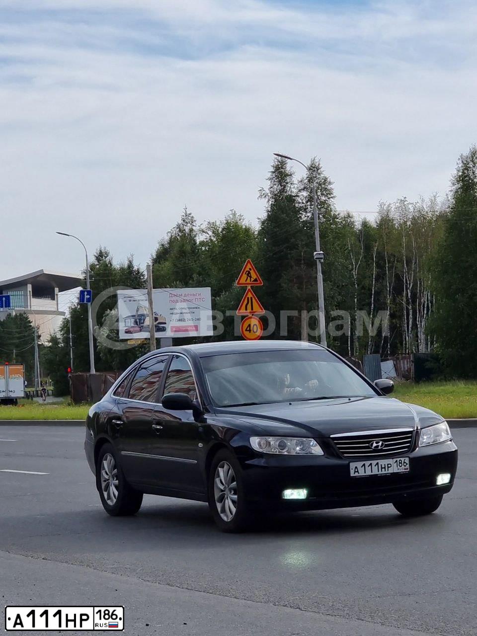 Фото автомобиля KIA SORENTO, 2013 — госномер В885УК186. Цвет: БЕЖЕВЫЙ