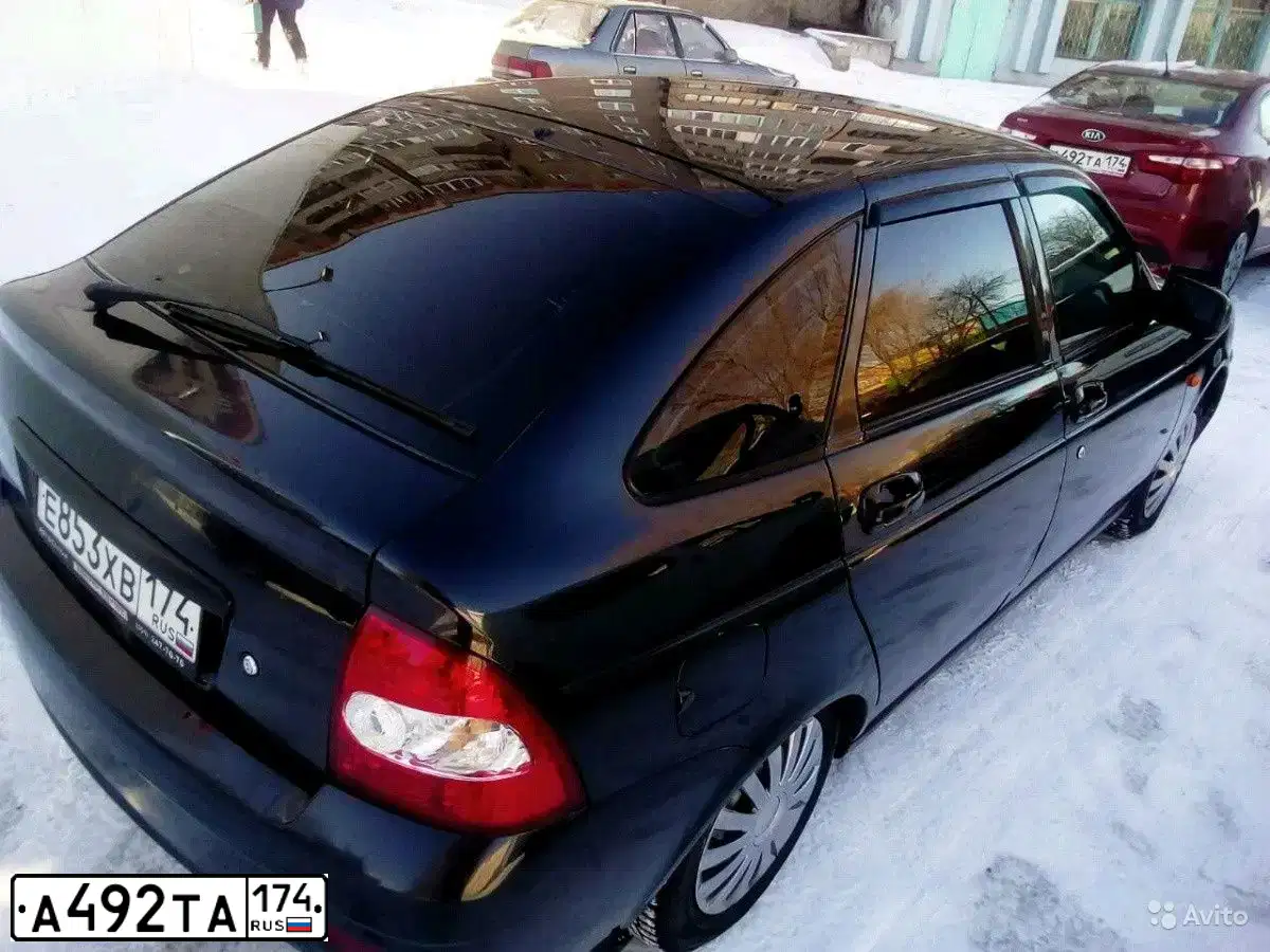 Фото автомобиля KIA RIO, 2014 — госномер Р866ХК196. Цвет: Красный