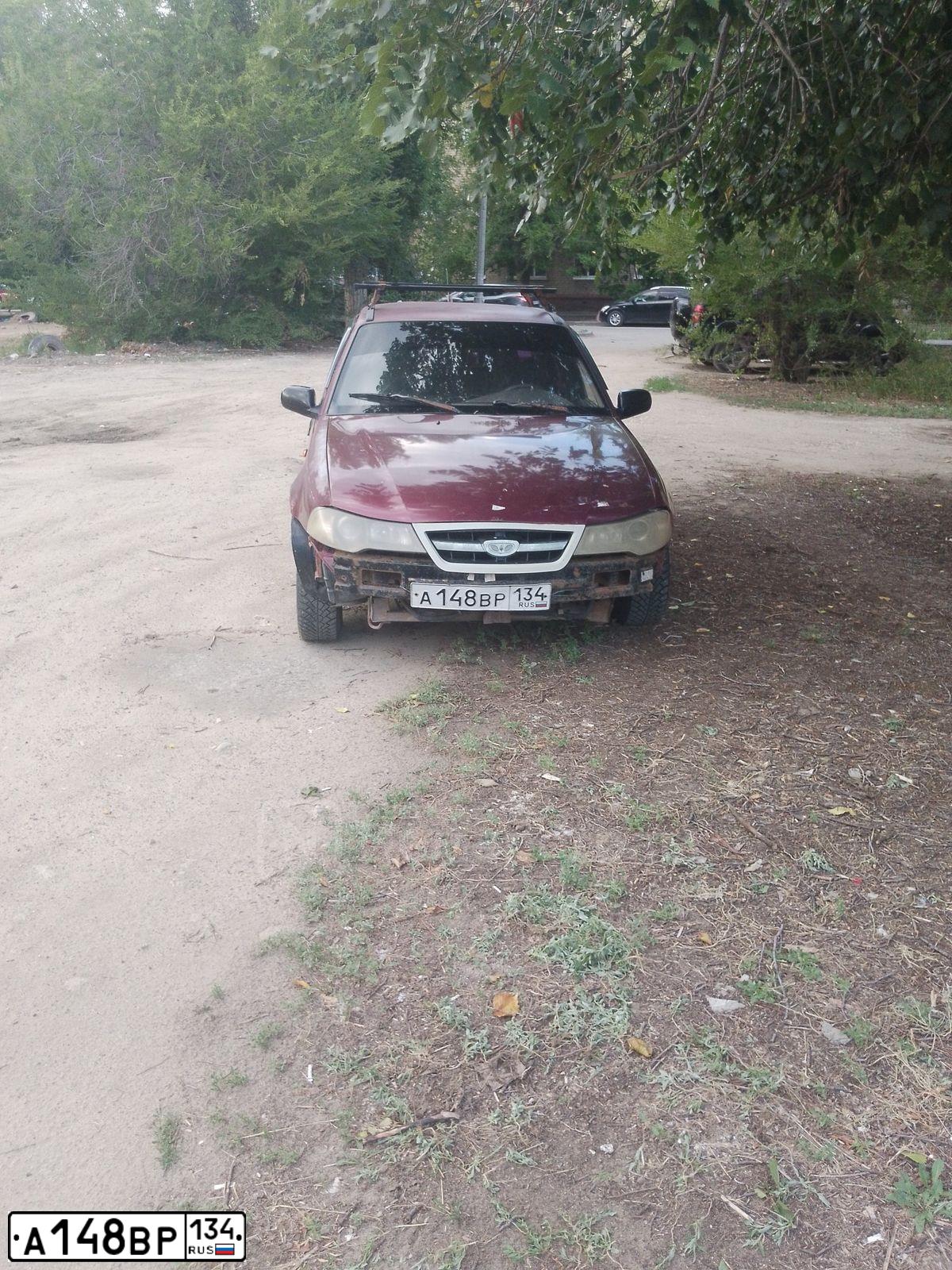 Фото автомобиля DAEWOO NEXIA, 2010 — госномер А148ВР134. Цвет: СПЕЛАЯ ВИШНЯ